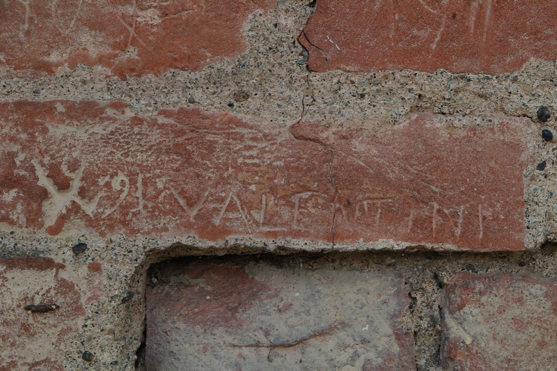 Nomi di persone incisi sui muri della Cittadella di Alessandria. 1891. W 91  VALENTINI.