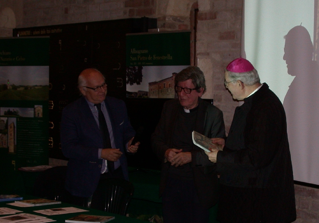 Consegna copia del volume "Sacri volti ed antiche pievi" al Vescovo di Asti S.E. Mons. Francesco Ravinale.