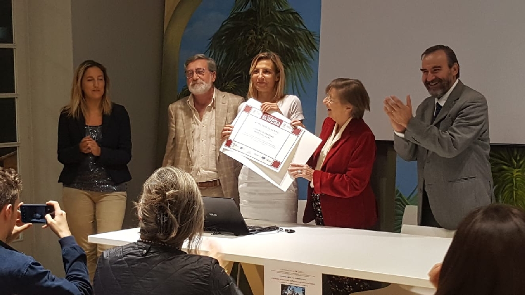 Applauso del pubblico presente in sala per l importante riconoscimento, assegnato dalla Giuria del Premio "La Fabbrica nel Paesaggio" al Floriseum del Comune di Sanremo.